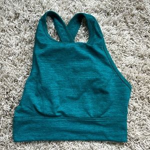 Cute teal toned exercise top, perfect condition.
